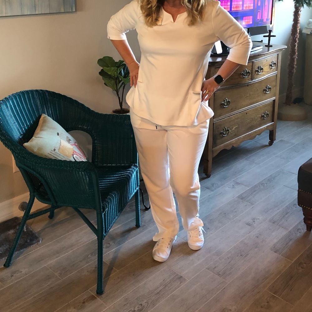 JAANUU Scrubs White All 3 sets for $100.